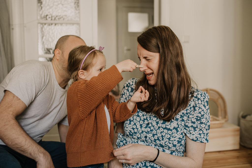 Familienfotos und Babybauch