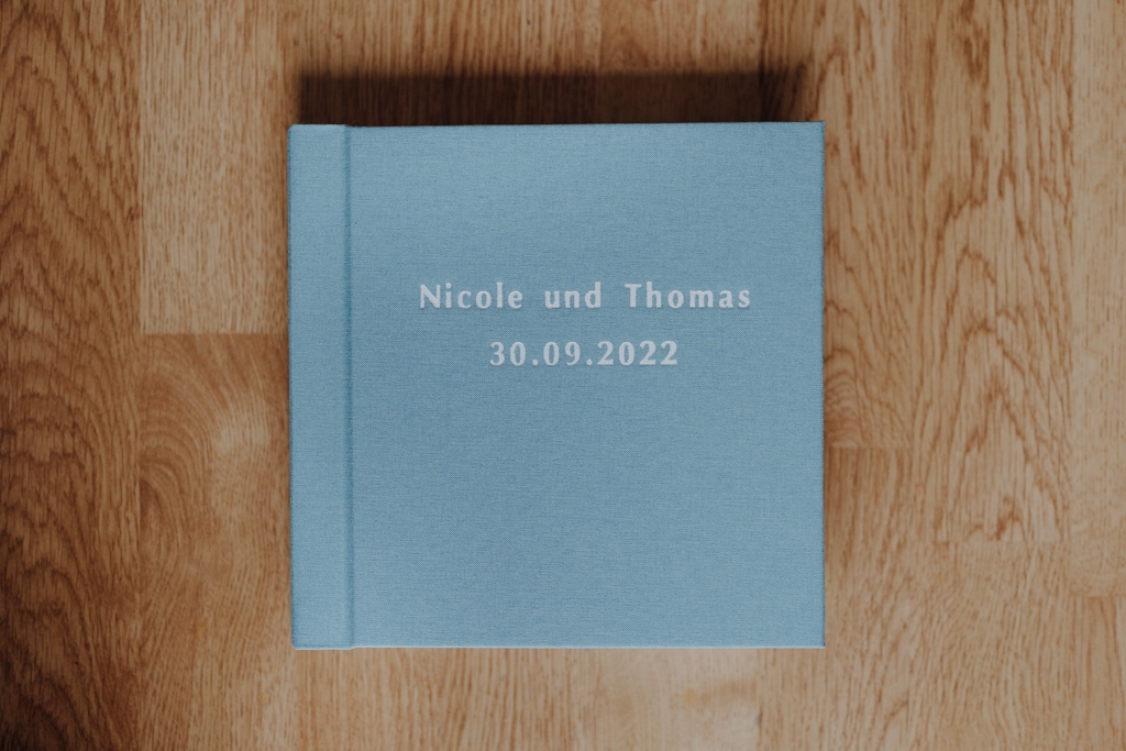 Preise 1 blaues Fotobuch Hochzeitsbuch Hochzeitsalbum von einer Hochzeitsfotografin mit starken Seiten